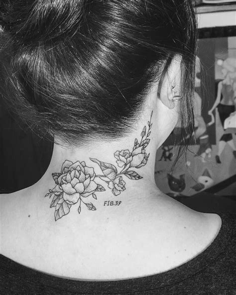 ladies tattoos back neck